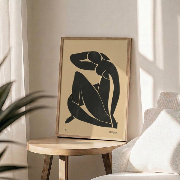 Minimalist poster art showing an abstract female form in bold black linework against an off-white ground, reflecting meditative elegance.