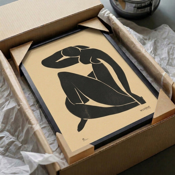 Framed modern figure study with a contemplative black silhouette on cream background, showcasing minimalist line art in the spirit of iconic paper cutout masters.