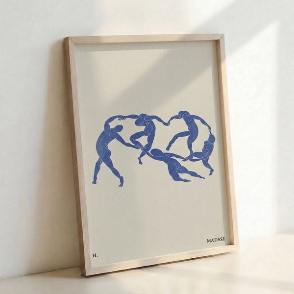 Contemporary framed poster with contemplative dancing nudes drawn in minimalist cobalt blue strokes against a cream base.