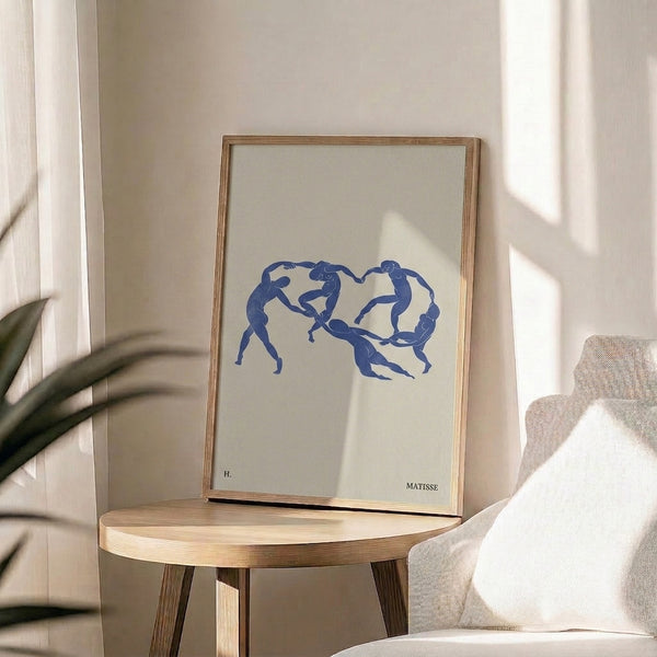 Modern wall art showcasing graceful female forms in continuous blue line drawing style, evoking fluid movement and elegance.
