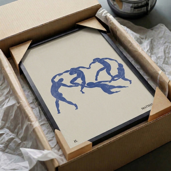 Framed contemporary print of contemplative dancing figures in minimalist cobalt blue linework on cream, inspired by classic modern art.
