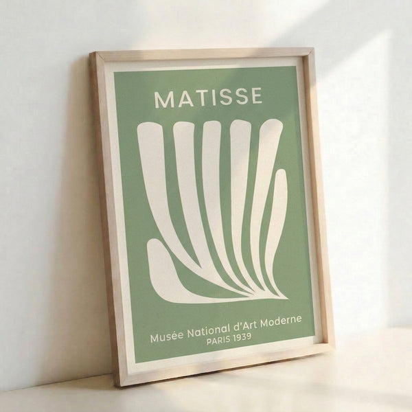 Abstract Matisse poster showcasing an elegant hand reaching among stylized plant leaves in soft sage green, a restrained mid-century modern masterpiece.