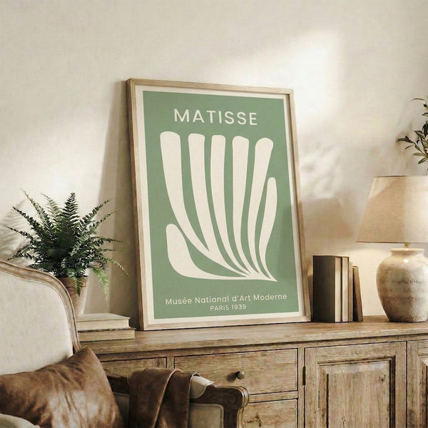 Sophisticated modernist composition featuring a delicate hand and organic plant forms rendered in sage green and cream, a serene Matisse-inspired wall art piece.