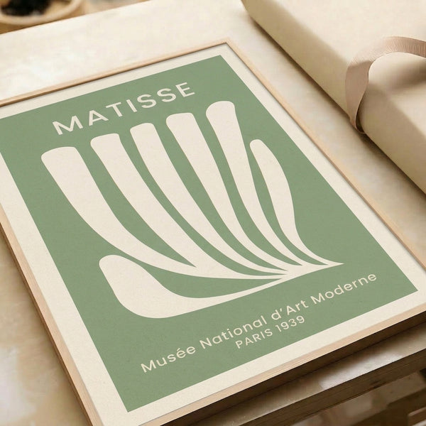 Matisse 1939 exhibition poster art: minimalist composition of hand and leaves in muted sage and cream hues, refined modernist wall piece.
