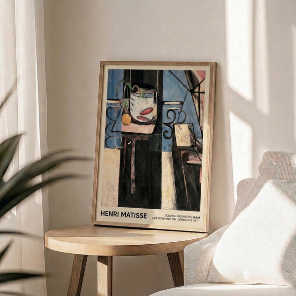 Artistic wall poster with goldfish and artist palette in bold reds and blues, framed display of modernist still-life composition.