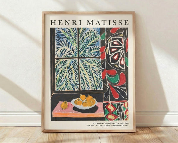 Framed modern art print of a serene interior featuring a window with patterned Egyptian curtain, potted ferns, fresh lemons in a bowl, and decorative elements in cream, blue, and green tones.
