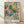 Matisse-inspired framed poster depicting a young girl in a vibrant interior with emerald green walls, featuring a chair, table with fruit and flowers, rendered in warm yellows, coral reds, and soft pinks.