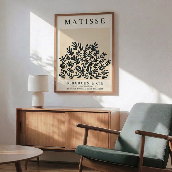 Abstract botanical poster with flowing coral and seaweed shapes in charcoal and beige tones, serene mid-century composition.