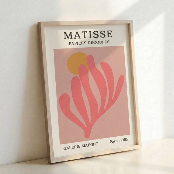 Abstract botanical cut-paper style framed poster featuring soft pink and golden ochre shapes on neutral background, capturing refined modernist elegance.