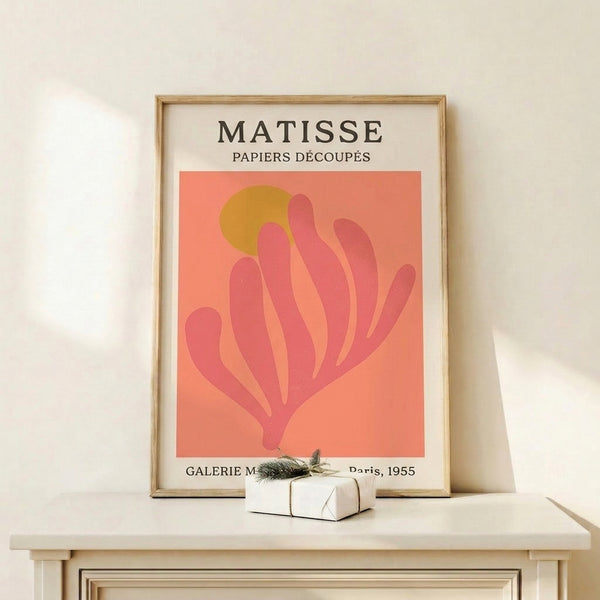 Mid-century modern wall art with organic plant motif in muted coral and cream palette, displaying serene minimalist aesthetic.