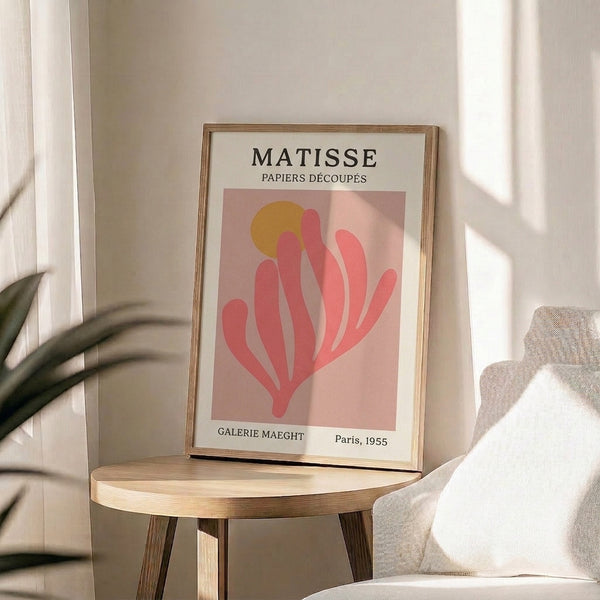 Abstract botanical poster in warm cream and coral pink hues, featuring elegant simplified leaf form characteristic of mid-century decorative arts.