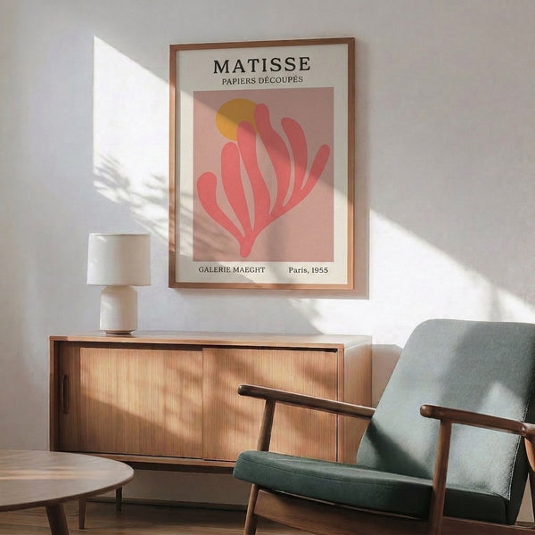 Minimalist wall poster with abstract leaf motif in dusty mauve and ochre palette, embodying tranquil mid-century elegance.