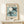 Abstract bird artwork in cool dusty blue and neutral cream, evoking the whimsical yet refined spirit of mid-century modernist design.