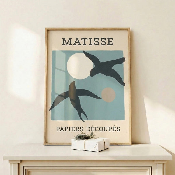 Abstract bird artwork in cool dusty blue and neutral cream, evoking the whimsical yet refined spirit of mid-century modernist design.
