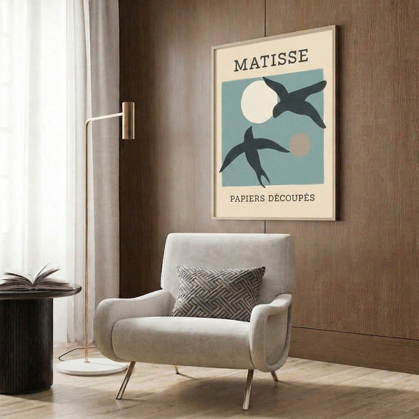 Sophisticated art print displaying geometric bird silhouette alongside moon form in cream and charcoal, inspired by modernist paper-cut traditions.