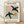 Framed abstract bird art print in Matisse style featuring sage green, blush pink, and ochre cut-out shapes with playful minimalist composition on cream background.