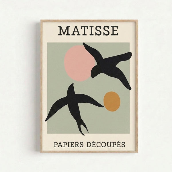 Mid-century modern poster with abstract birds rendered as geometric paper cut shapes in muted sage green, black, and soft pink tones, creating balanced sophisticated wall art.