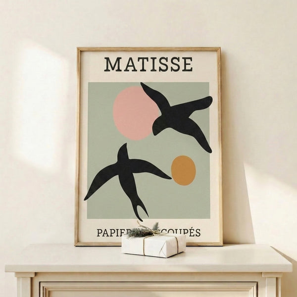 Abstract bird artwork in the papiers découpés technique, featuring soft sage green and pink cut-out forms against a cream ground with Matisse-influenced modernist balance.