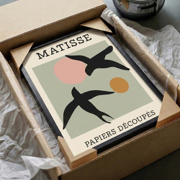 Bauhaus bird print with playful abstract composition of circles and organic shapes in balanced sage green, blush pink, ochre, and cream tones on framed poster.