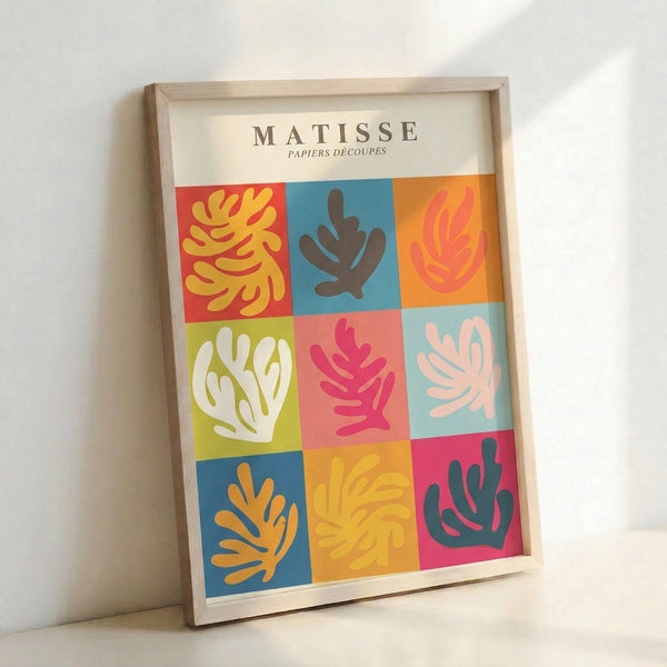 Pop art poster showcasing an exuberant mix of abstract leaf and plant motifs in dusty rose, chartreuse, and sky blue tones, celebrating the bold cut-paper aesthetic of mid-century modern design.