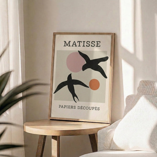 Contemporary wall art showing an abstract bird with geometric forms in soft beige and dusty rose hues.
