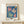 Sophisticated cut-paper style artwork displaying organic cactus and botanical motifs in a palette of terracotta pink, cream, and deep blue.