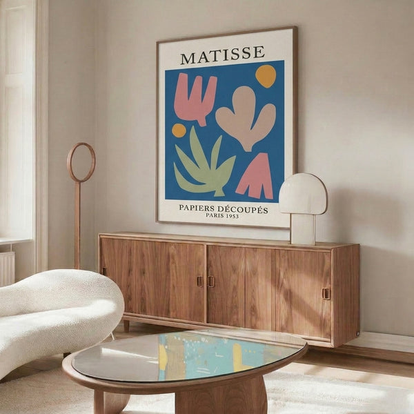 Sophisticated framed poster with organic leaf and circular forms in a warm terracotta and cool sage palette against cream, evoking Bauhaus design.