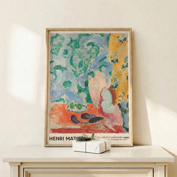Intimate table arrangement poster depicting aubergines, pitcher, and plate amid vibrant foliage in warm coral and cool blue tones, framed wall art.