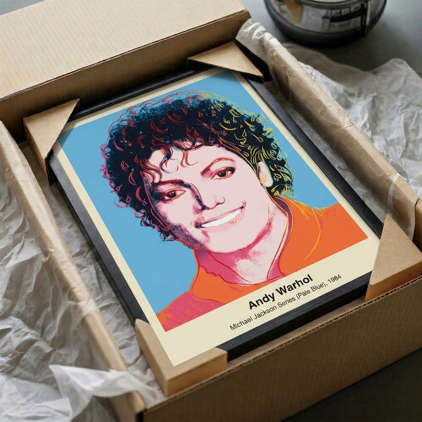 Iconic pop art depiction of Michael Jackson in pale blue with black graphic elements and hot pink accents, framed as wall art.