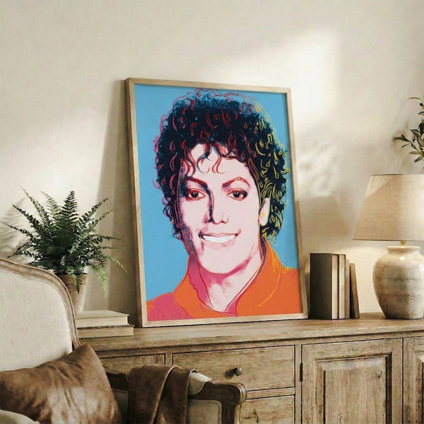 Pale blue pop art portrait of Michael Jackson framed on wall, contemporary artist interpretation of 1980s pop culture icon.