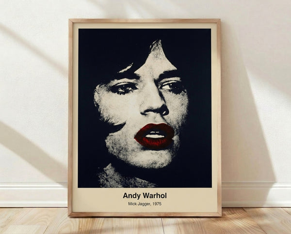 Pop art portrait of Mick Jagger in vibrant magenta, yellow, and cyan on cream background, featuring bold abstract brushstrokes and high-contrast black outlines in Warhol's iconic style.