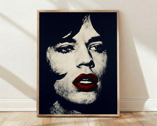 Pop art portrait of Mick Jagger in vibrant colors and bold graphic style, framed on a wall as a modern art print.