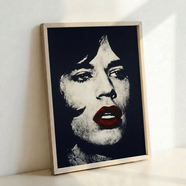 Framed contemporary pop art poster depicting Mick Jagger in vivid, saturated colors with graphic portrait technique.