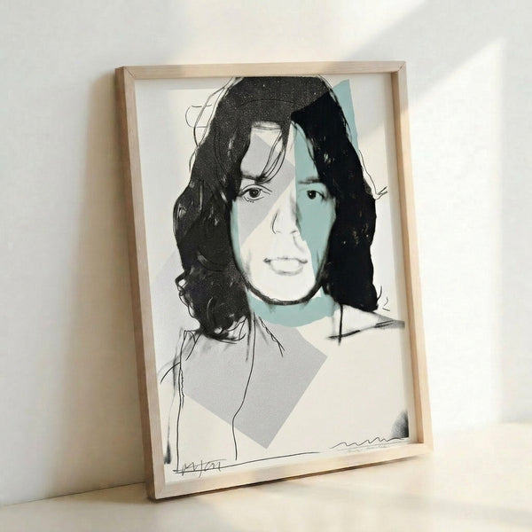 Mick Jagger portrait rendered in vivid pop art style with striking color contrasts, presented as a framed poster.