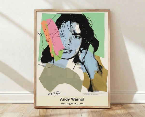 Bold pop art portrait of Mick Jagger in vibrant cyan, magenta, and yellow with black and white accents, featuring expressive brushwork and edgy modern aesthetic.