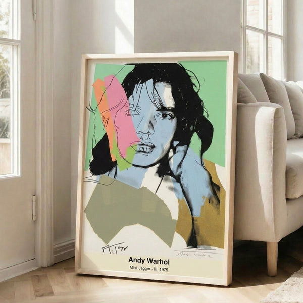 Edgy pop art portrait featuring expressive facial features rendered in vibrant neon colors—cyan, magenta, and yellow—against striking black and white contrast.