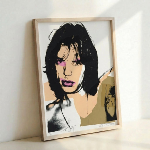 Colorful contemporary art print of a male rock icon rendered in vivid pop art technique with layered tones and graphic intensity, hung as a framed poster.