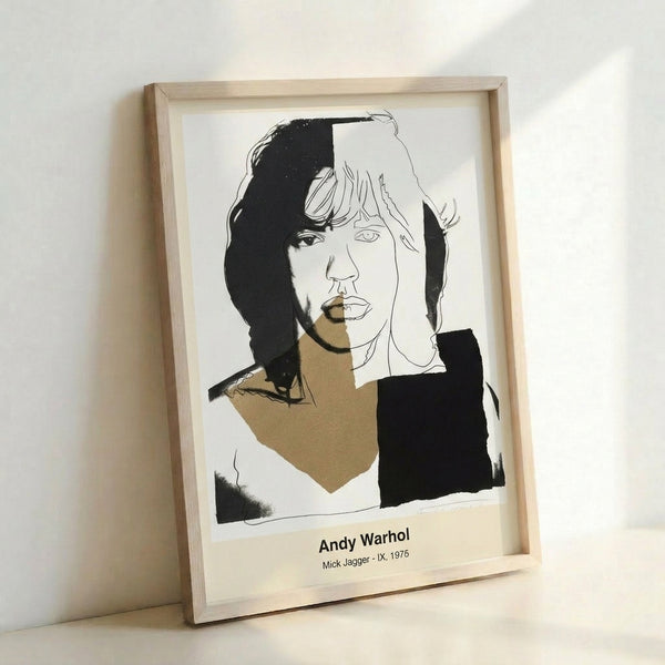 Framed modern pop art poster depicting Mick Jagger in bright cyan, magenta, and yellow tones with high-contrast black lines and flesh-tone accents.