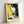 Abstract modern portrait of Mick Jagger in hot pink and lime green with yellow and black accents, a bold pop art composition celebrating the legendary musician.