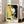 Edgy pop art wall art featuring Mick Jagger in neon lime green and hot pink with yellow and black elements, modern abstract musician portrait.