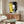Abstract portrait print of Mick Jagger featuring bold color palette and graphic pop art style in wall frame.