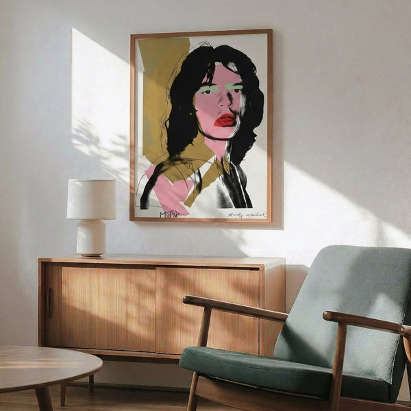Framed wall art featuring Mick Jagger's portrait in vivid pop art colors, a bold statement piece inspired by iconic 1960s art movements.