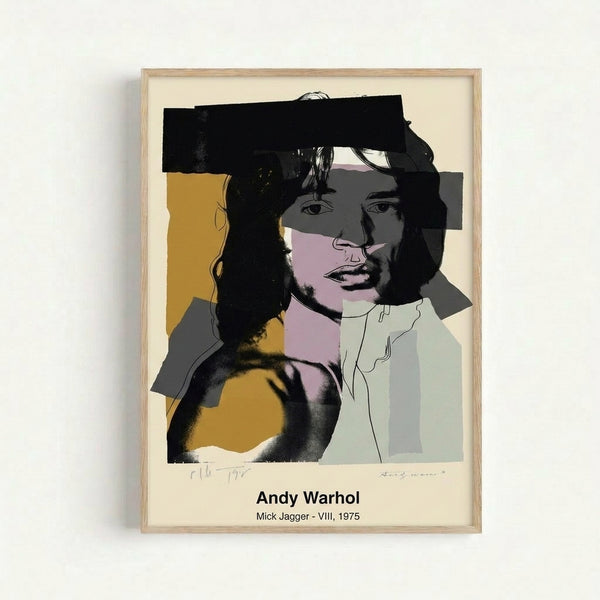 Framed modern pop art print featuring Mick Jagger's face in striking neon pink and yellow against deep black, capturing an edgy, expressive aesthetic.