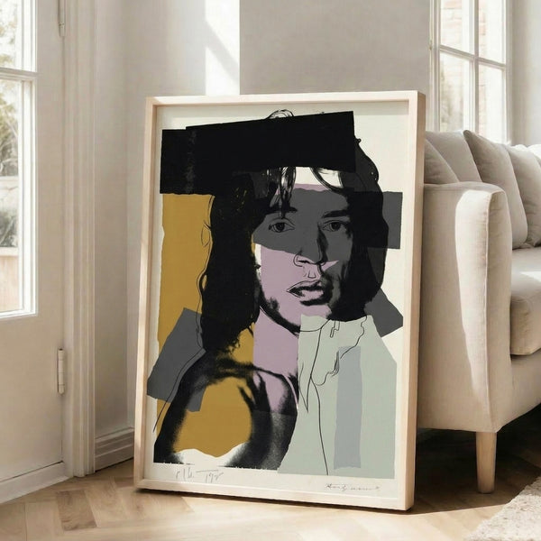 Bold graphic portrait of Mick Jagger rendered in saturated pops of color with high-contrast outlines, exemplifying Andy Warhol's pop art aesthetic.
