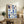 Warm and cozy vintage-style poster featuring organized illustrations of classic coffee bar tools and vessels in a mid-century aesthetic with navy blue, light teal, and terracotta accents.