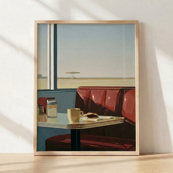Mid-century modern poster art depicting a solitary diner booth with a coffee cup on the table, framed window view of a desert highway and gas station at sunset in shades of red, teal, cream, and gray.