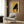 Contemporary minimalist wall art depicting a grand piano in warm goldenrod hues against a neutral cream background, contemplative and refined.