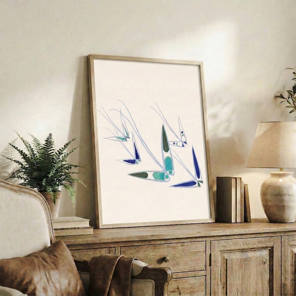 Contemporary sailboat print inspired by midcentury aesthetics, depicting a tranquil regatta in cream, navy, and sage green hues.