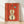 Framed minimalist mid-century poster featuring a coral red violin with gold accents and teal details on a cream background, evoking sophisticated artistic elegance.