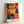 Abstract wall art poster showcasing Matisse's distinctive cutout technique applied to flowering mimosa leaves and blooms in vibrant warm tones and cool blue accents against a dark background.